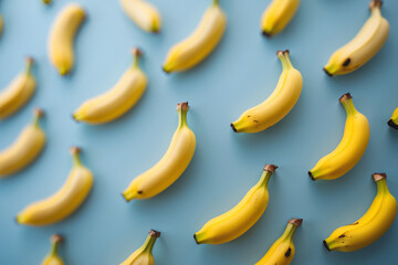 Pattern of Fresh Yellow Bananas on Blue Background