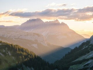 Majestic mountain range sunset golden hour alps