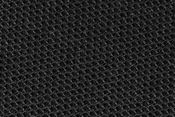 Texture of dense black fabric for tailoring. Canvas. Textile