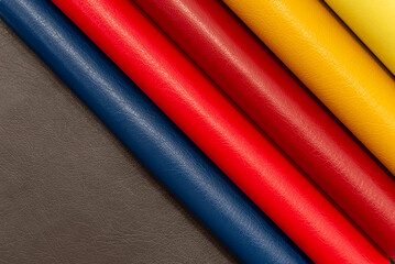 Palette of multi-colored pieces of genuine leather. Accessories for sewing. Leather material