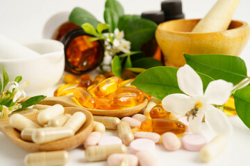 Alternative medicine herbal organic capsule with vitamin E omega 3 fish oil, mineral, drug with herbs leaf natural supplements for healthy good life.