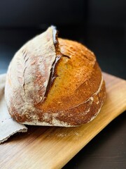  freshly baked sourdough bread with a textured, golden crust.