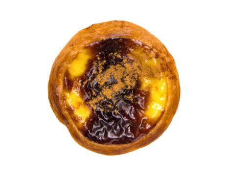 pastel de nata famous Portuguese custard pastry with flaky crust and caramelized burnt top with sprinkling of cinnamon on a plain white background (dessert sweet pastries pasteis from portugal)