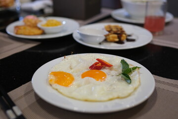 Eggs bacon chilies Breakfast tacos with eggs, bacon and hash browns garnished with green onion, camera slides. High quality 4k footage