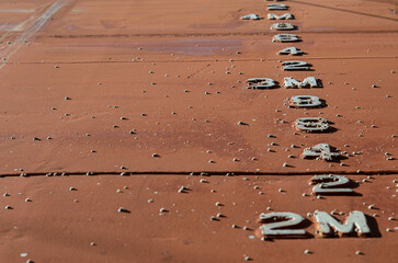 The close look at the vessel draught marks. The numbers are welded on the ship hull and shows how...