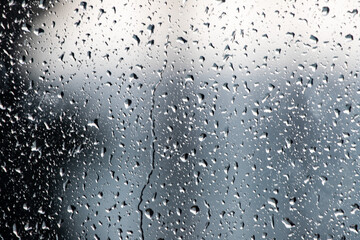 A window with raindrops on it
