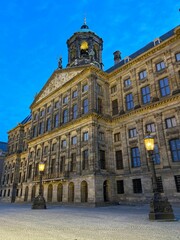 Fototapeta premium The Royal Palace of Amsterdam at dusk.