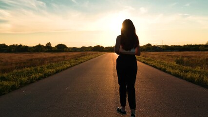 silhouette sports girl running along road sunset, fit athlete, smiling woman running training, running man, jogging dusk, urban marathon runner crossing finish line, wellness, compete for ball - Powered by Adobe