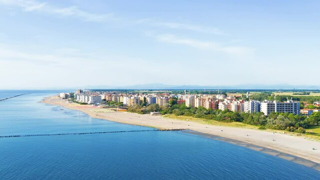 Drone view of the umbrellas and gazebos on Italian sandy beaches. Adriatic coast. Emilia Romagna region