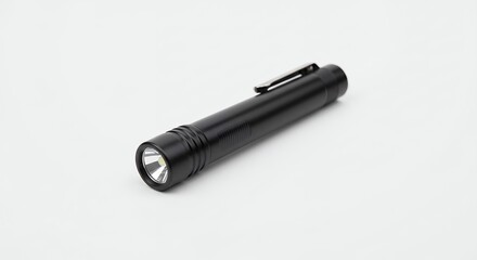 Black handheld flashlight isolated on white background