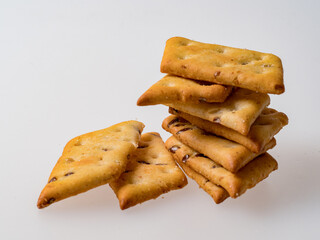 The family is sitting at home on the mats