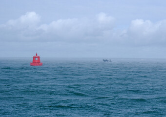 Stormy weather with squally clouds and rain in the Solent, on the South coast of the UK