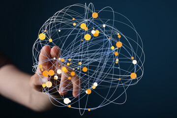 Abstract image depicting a hand interacting with a complex network of interconnected nodes,...