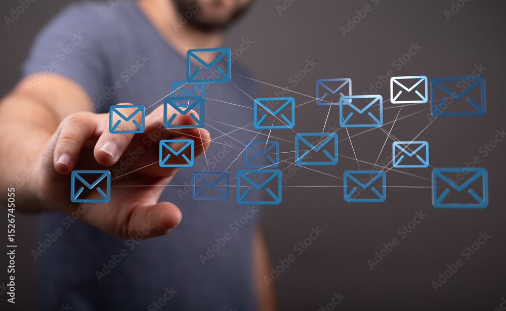 Aufkleber a man interacts with a digital network of email icons, representing communication and connectivity.