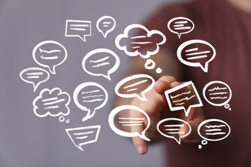 Abstract image of hand interacting with speech bubbles,communication, dialogue, ideas.