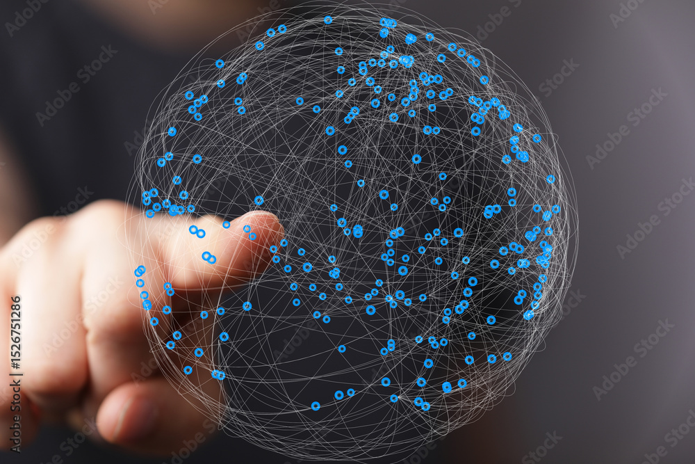 Fototapete Abstract image of a hand interacting with a digital sphere representing global network connections.