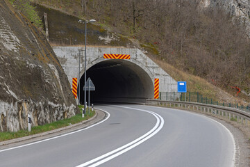 Cuved Road in to Concrete Tunnel Under Mountain Serbia Spring Day