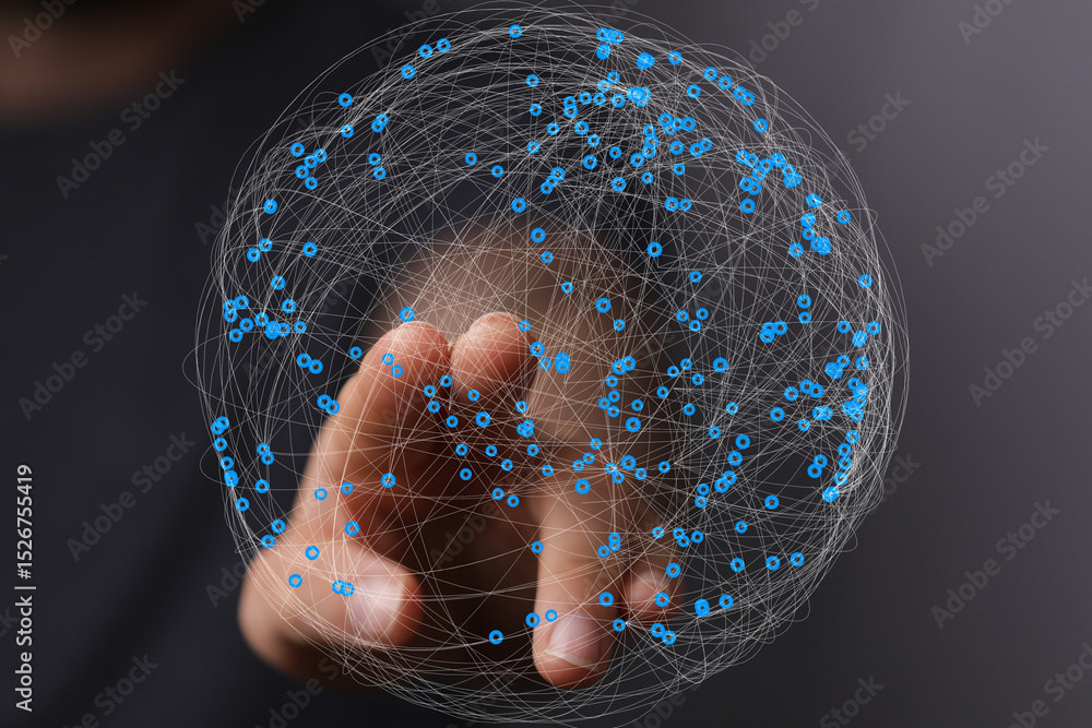 Aufkleber Abstract image of a hand interacting with a digital sphere representing global network connections.