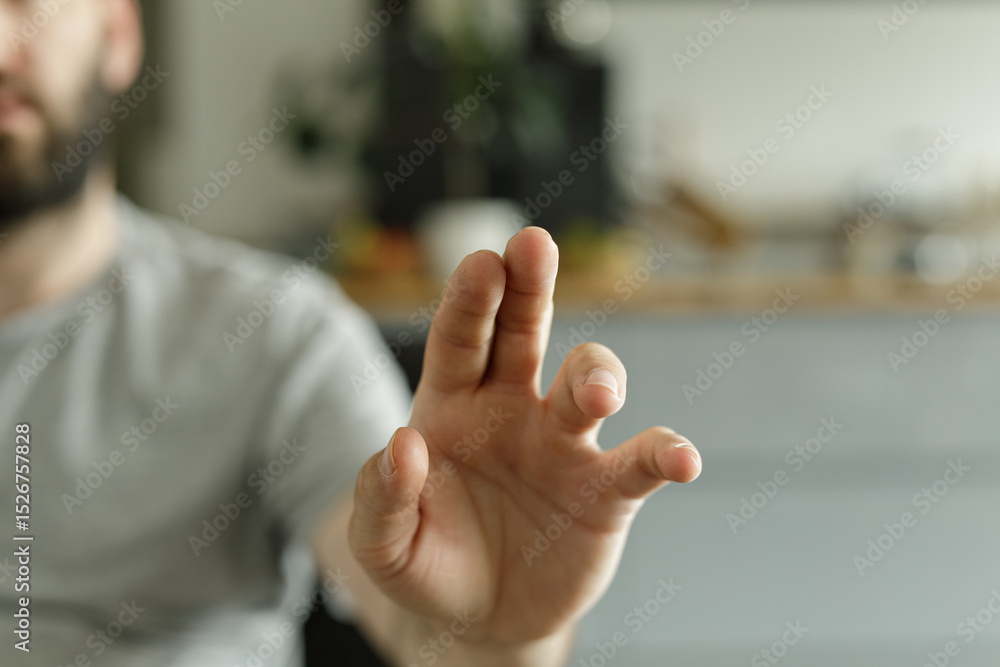 Poster close up of a man's hand reaching out. perfect for concepts of connection, help, or interaction.
