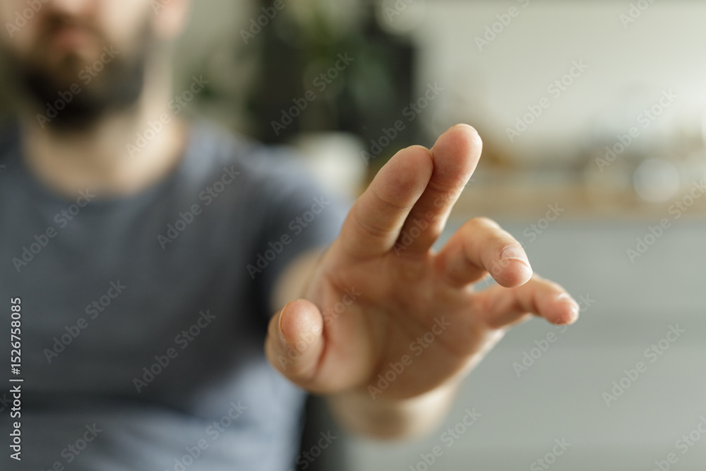 Poster close-up of a man's hand reaching out. perfect for concepts of connection, help, or interaction.