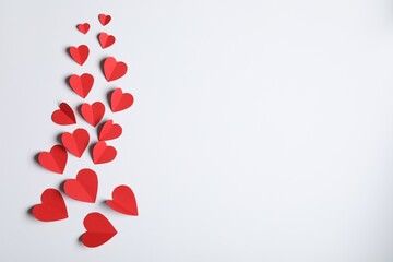 Many paper hearts on light grey background, flat lay. Space for text