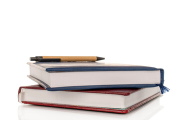 Two notepads for notes, close-up, isolated on white background.