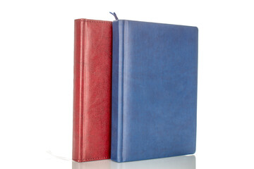 Two notepads for notes, close-up, isolated on white background.