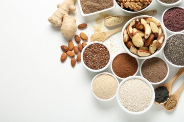 Different superfoods on white background, flat lay. Space for text