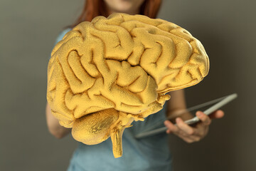 Abstract image of a golden brain, representing intelligence, technology, and innovation.