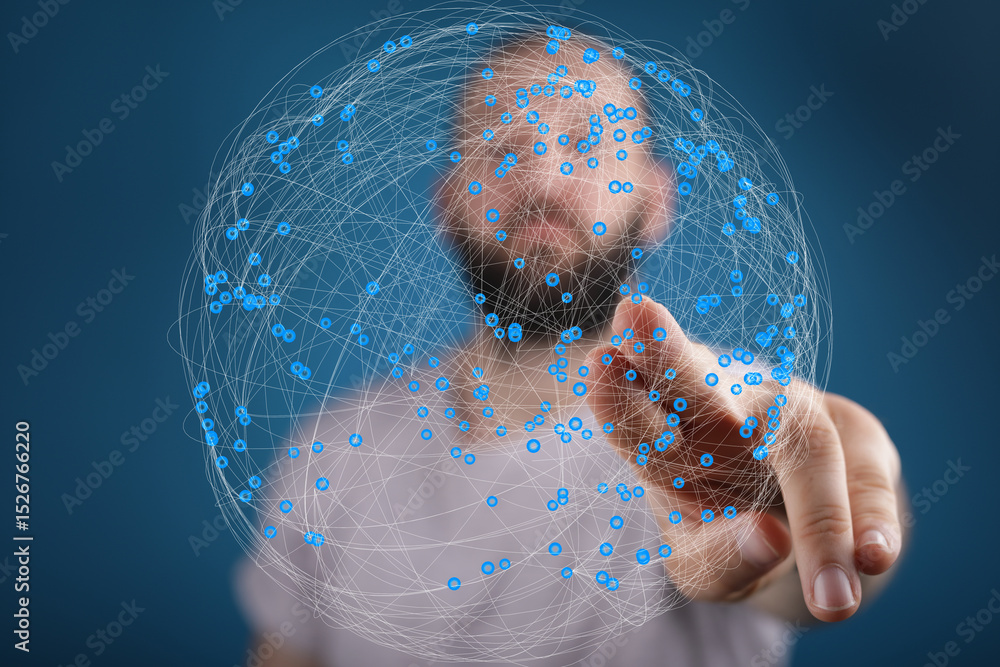 Fototapete A man interacts with a digital sphere, representing global networking and connectivity.