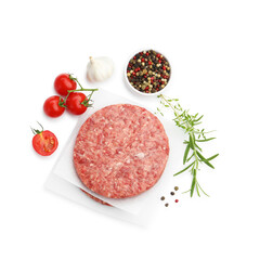 Fresh raw patty for burger, tomatoes and spices isolated on white, top view