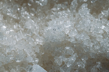 Close-Up of Sparkling Sugar Crystals on Neutral Background