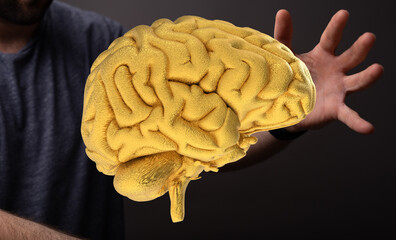 Abstract image of a golden brain. Represents intellect, ideas, and innovation.