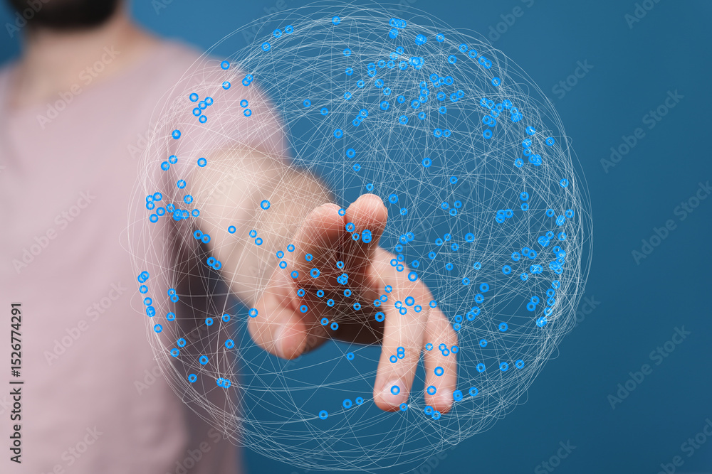 Leinwandbilder Abstract image of a hand interacting with a digital sphere representing global networking and connection.