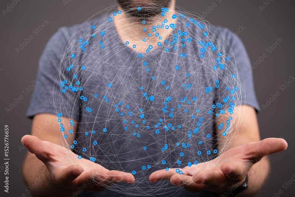 Leinwandbilder a man holds a digital globe representing global connections and networking.