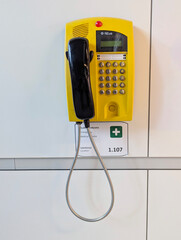 Yellow emergency phone for emergency medical communication in a public place, Poland