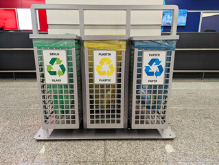 Metal waste containers for separate waste at Warsaw Airport, Poland