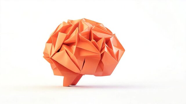 Orange origami brain sculpture symbolizing creativity and intelligence on a white background