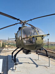 old military helicopter with its olive green color