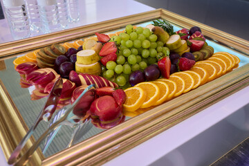 An Elegant and Colorful Fruit Platter Featuring a Variety of Exquisite Exotic Fruits