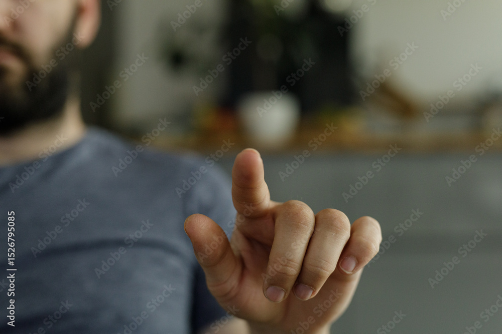 Aufkleber Close-up image of a man's hand pointing at a screen.  Perfect for technology, interaction, or digital concepts.
