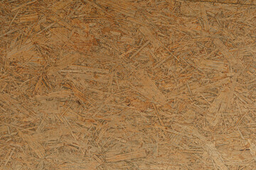 High-resolution image of brown particle board texture, perfect for backgrounds and design projects.