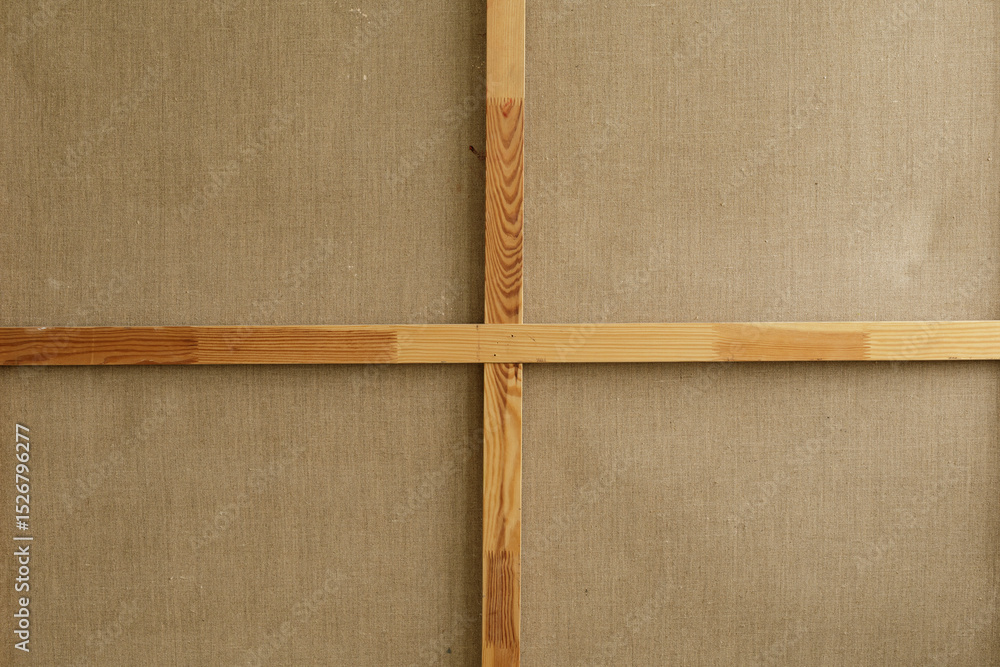 Poster High-resolution image of a beige canvas with a wooden cross support. Perfect for texture backgrounds.