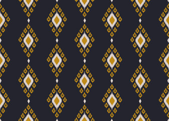 Ikat pattern on dark blue background.Beige and brown diamond pattern.Diamond shape.Geometric shape.Digital design.Ethnic.Illustration.Line.Vertical pattern Design for clothes.Dress
