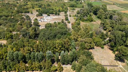 Aerial View of Archaeological Ruins of Dion, Greece in a Lush Green Landscape