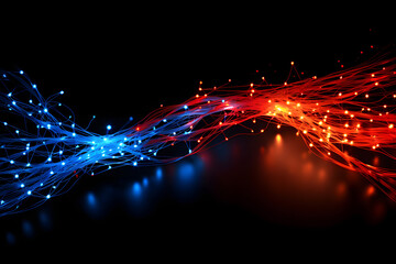 Colorful abstract wave of light particles in blue and red against a dark background representing energy and movement