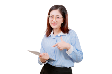 A young woman wearing glasses and a striped shirt holds a tablet and points at it with a confident expression.