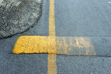 road sign on asphalt