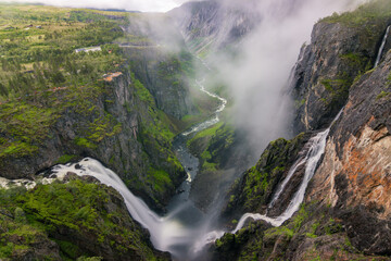 Majestic waterfall of Vøringfossen in a foggy day (Norway)