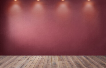 Red wall with a row of spotlights in an empty room